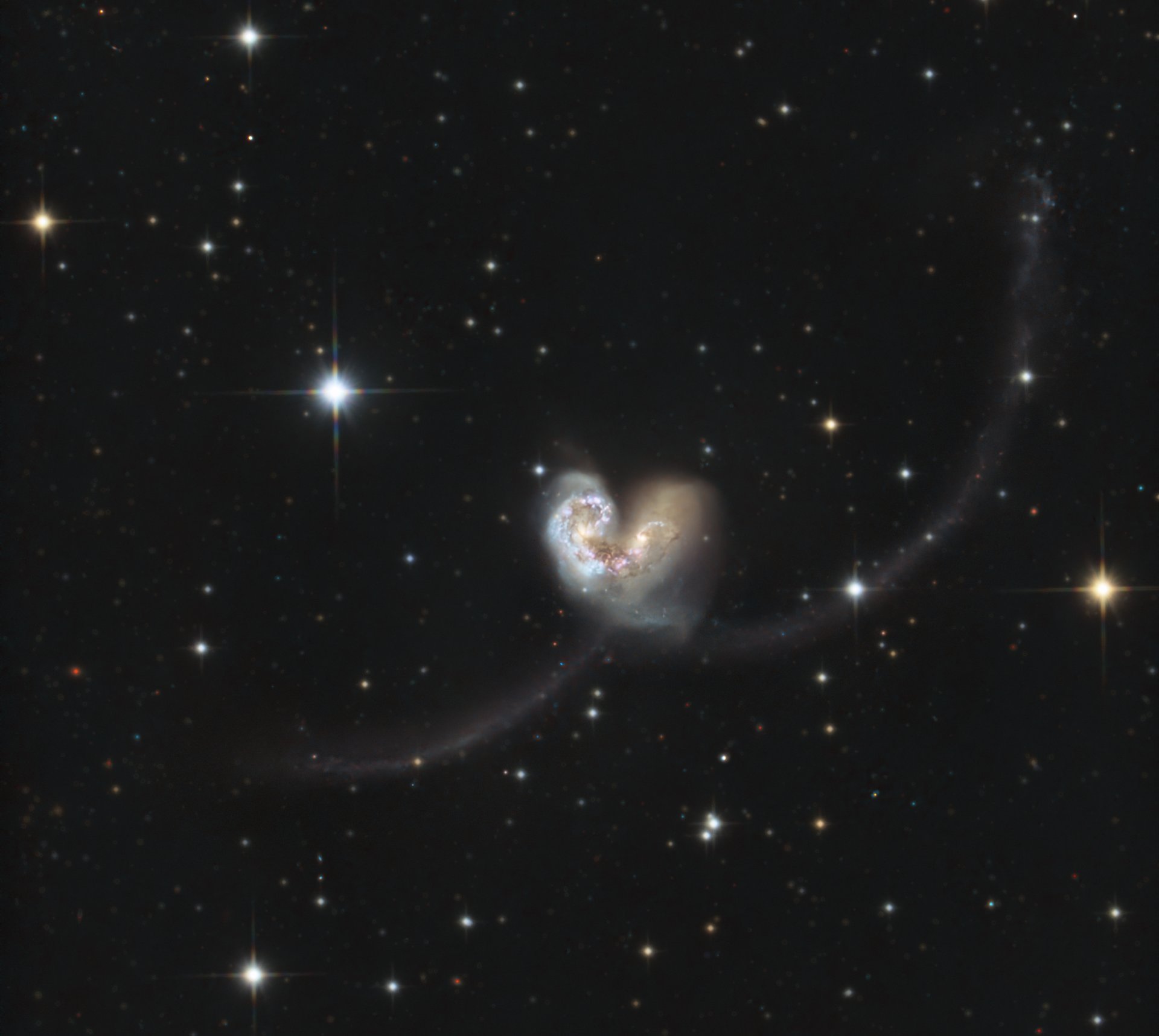 NGC 4038 and NGC 4039, the Antenna Galaxies.